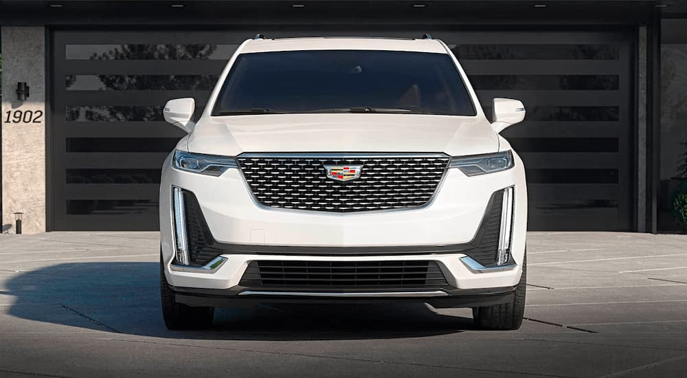 Front of a white 2025 Cadillac XT6 parked in a driveway
