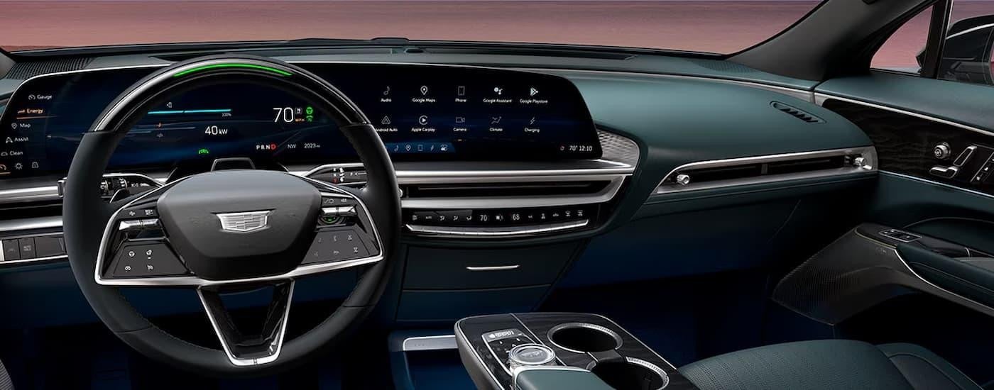 The black and silver dashboard in a 2024 Cadillac LYRIQ for sale.