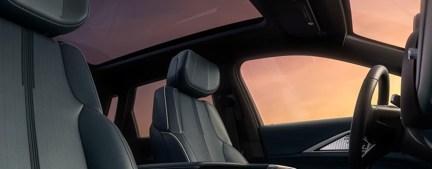 The front seats in a 2024 Cadillac LYRIQ are shown.